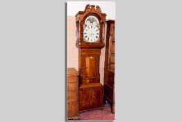 A 19th Century mahogany longcase clock, twin weight driven eight day movement striking on a bell