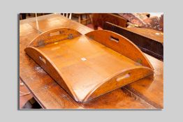 A George III style oak butler's tray with brass hinges to folding sides, all curved with carrying