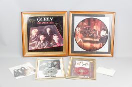 A Queen Greatest Hits album sleeve with all four band member's signatures, with original Bulgaria