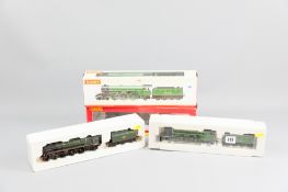 Two Hornby 00 gauge steam locomotives and tenders, R2180, BR4-6-2, Britannia Class 7MT locomotive