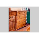 A 19th Century oak chest of two short over three long drawers with panel sides on bracket feet,