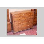 A Victorian oak chest of two short over three long drawers, rounded pillar decoration on shaped
