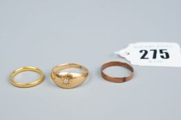 A twenty two carat gold narrow wedding band, 3.2 grms, a nine carat gold wedding band, 1 grm and