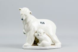 A Lladro group of a polar bear and her two cubs, circa 2005
