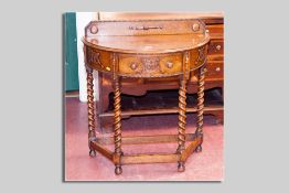 A single drawer half moon hall table with railback, carved and beadwork decoration on barley twist