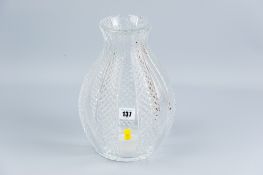 An heavy cut glass baluster vase of panelled form, each narrow panel alternating between plain and