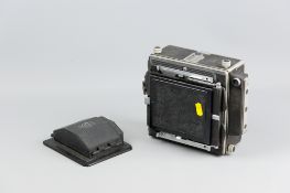An M.P.P 5x4 micro technical camera with additional accessory
