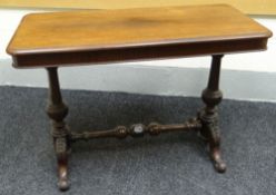 A rosewood side-table on turned bulbous supports and with carved cabriole legs and knopped