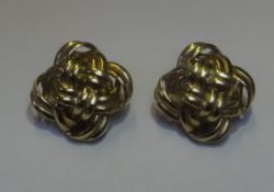 A pair of 9ct yellow gold ‘knot’ clip earrings 6.4 gms