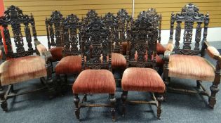 A set of eleven carved chairs comprising two imposing throne-like armchairs and nine matching