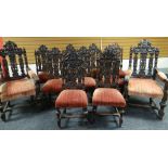 A set of eleven carved chairs comprising two imposing throne-like armchairs and nine matching