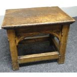 An exceptionally heavy small English joined-oak table with rectangular top and carved shaped aprons,