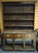 An oak dresser (distressed), circa 1830