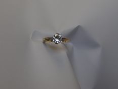 An 18ct yellow gold diamond solitaire ring with brilliant round cut diamond, approx. 1ct visual