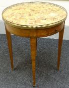 An inlaid kingwood and marble circular table with pierced brass gallery, single drawer and leather