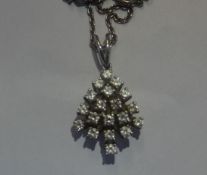 An 18ct white gold and nineteen-diamond ‘Christmas Tree’ shaped pendant