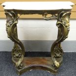 A gilt-wood and gesso console table in the Rococo style with shell and acanthus decoration to the