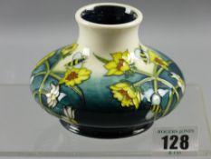 A Moorcroft pottery yellow floral decorated onion shaped vase, 8 cms high