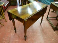 A Victorian mahogany twin flap table with single end drawer on turned tapering supports, 78 x 103