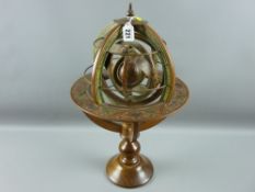 An armillary sphere (20th Century example), 49.5 x 30.5 cms