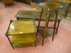 A modern mahogany tray top two tier side table with single base drawer and an oak two tier plant