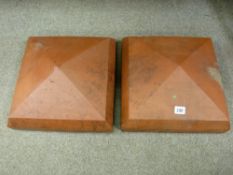 Two terracotta gate pillar caps, 35 cms square