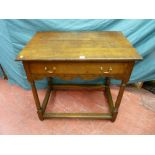 A 19th Century oak side table with single drawer, oak lined with later brass swing handles, the