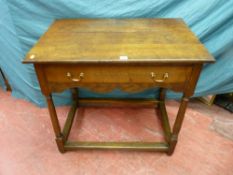 A 19th Century oak side table with single drawer, oak lined with later brass swing handles, the