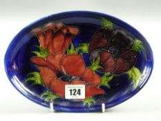 A Moorcroft pottery blue ground 'Anemone' oval dish, 23 cms long