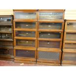 A pair of mahogany five section Globe Wernicke stacking bookcases with bottom drawer, 197 x 87