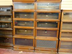 A pair of mahogany five section Globe Wernicke stacking bookcases with bottom drawer, 197 x 87