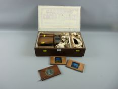 A quantity of mahogany framed hand painted Magic Lantern slides, some with changing views in a