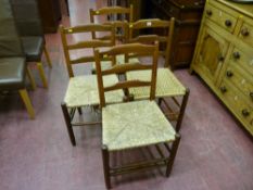 A set of four Clisset type ash chairs, three with original rush seating (requiring attention), one