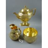 A three piece gilt silver tea service patterned in the classical style, the circular sugar basin and