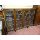A quality early 20th Century mahogany breakfront four door bookcase with adjustable interior