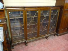 A quality early 20th Century mahogany breakfront four door bookcase with adjustable interior