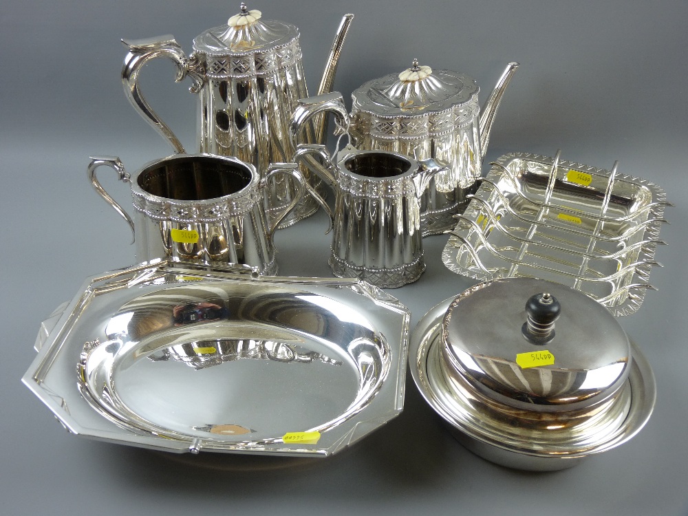 A Walker & Hall four piece bright cut Victorian teaset with fluted body, patent handles and ivory