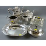 A Walker & Hall four piece bright cut Victorian teaset with fluted body, patent handles and ivory