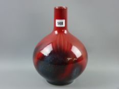 A Royal Doulton flambé veined bottle shaped vase, no. 1618, approximately 25 cms high