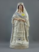 A Staffordshire pottery figure titled 'Queen of England, Empress of India, Crowned June 20th 1837,
