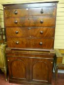 A Victorian mahogany chest of three long and two short drawers with turned wooden knobs for