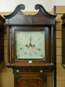 An 18th Century and later oak longcase clock, 13 ins square dial with date aperture set before an