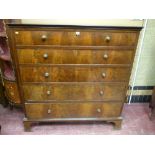 A late 19th/early 20th Century mahogany and crossbanded chest of five long drawers all with brass