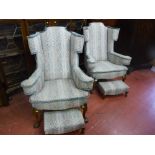 A good quality pair of reproduction walnut wingback armchairs and two footstools in matching