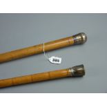 A malacca cane with hallmarked silver pommel grip, 86 cms and a bamboo cane having a white metal