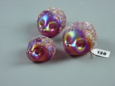 A set of three graduated iridescent Neo art glass hedgehog paperweights by Kris Heaton, etched