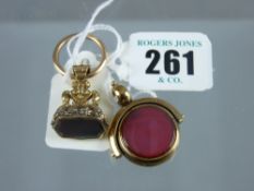 A yellow metal bloodstone pendant with loop, 10.6 grms and a ten carat gold swivel bloodstone and