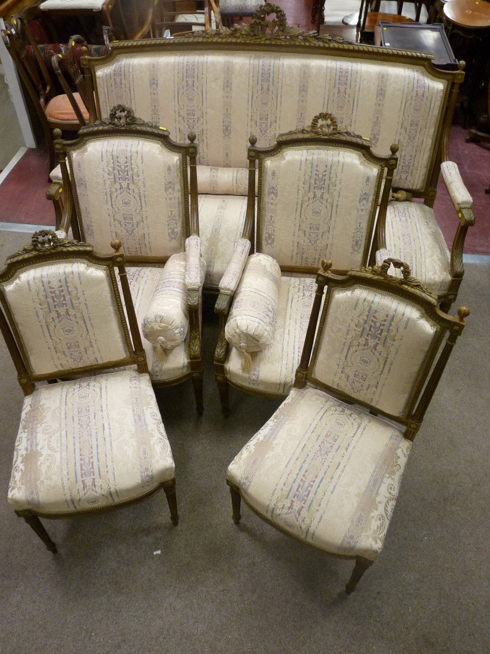 A Louis XVI French style salon suite of three seater couch, two side chairs and two armchairs,