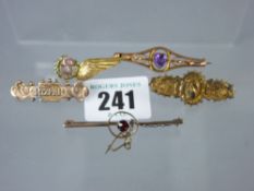 A parcel of five mainly nine carat gold bar brooches, 14.5 grms