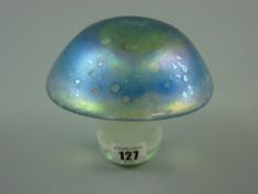 A John Ditchfield glass form iridescent mushroom paperweight, approximately 12 cms high, 14 cms